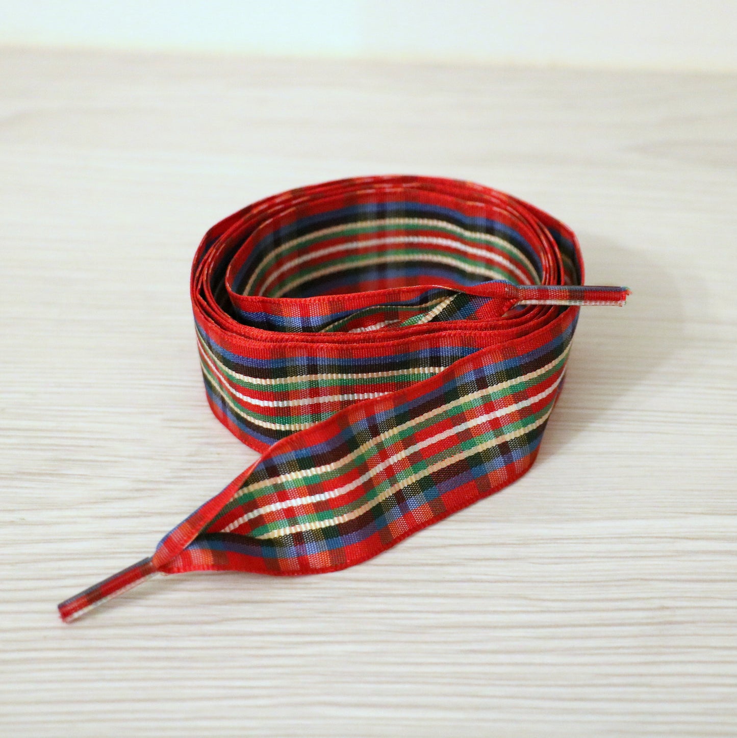 Lacets en tissu motif écossais