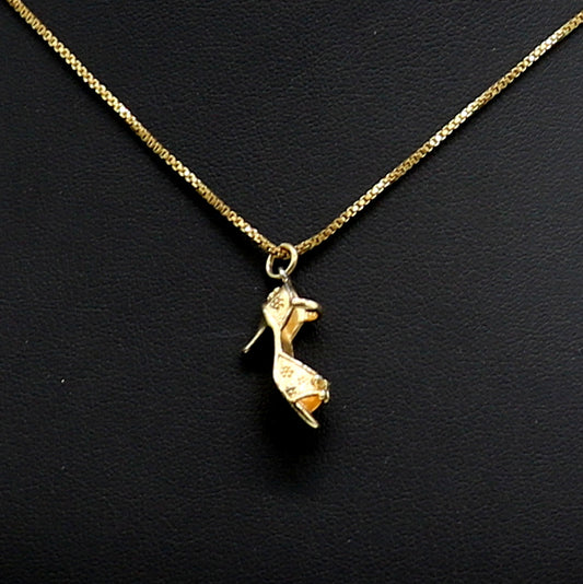 Pendentif chaussure à talons - doré