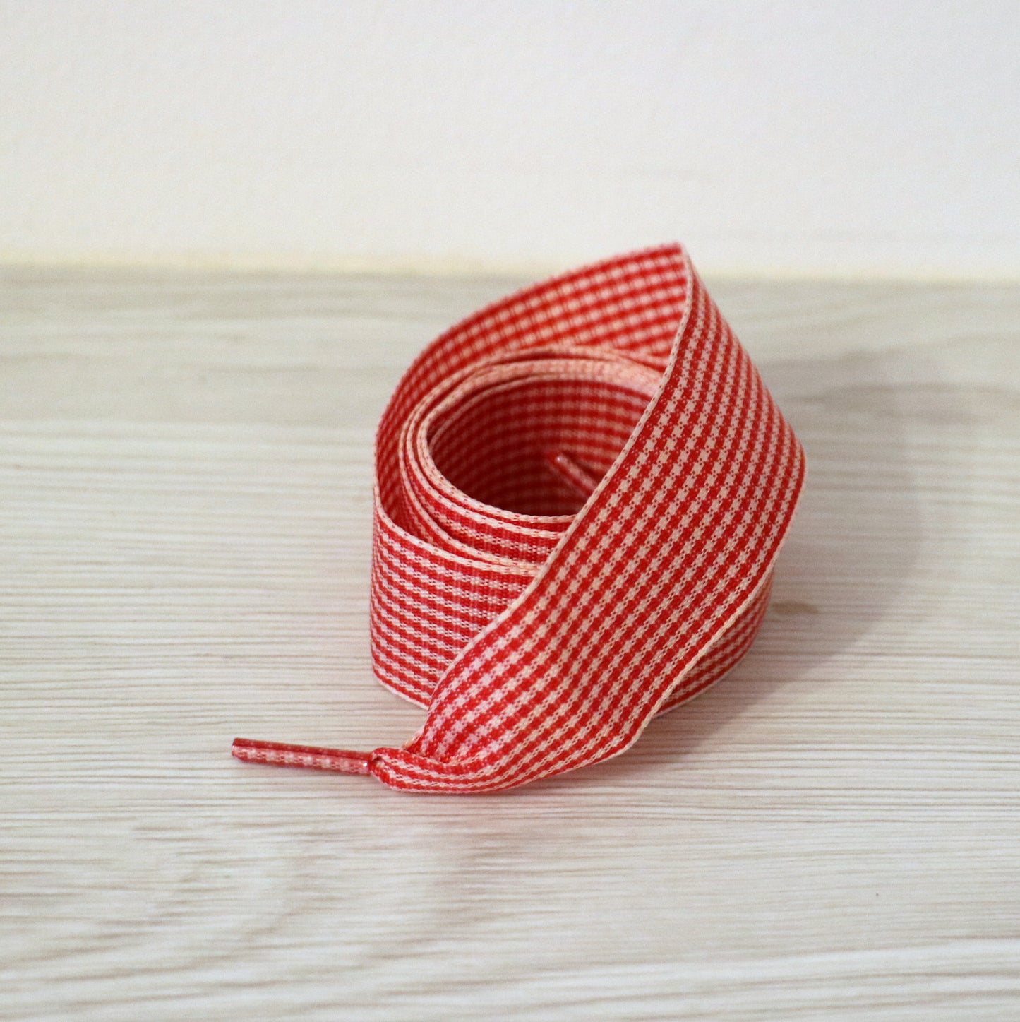 small red and white checkered shoelaces