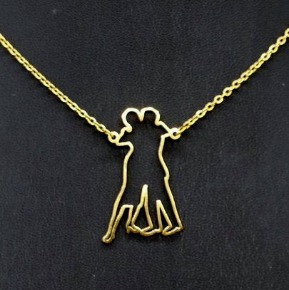Figure 3 silhouette tango dancers necklace - gold