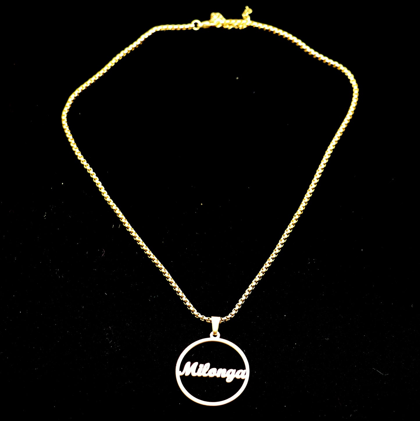 Golden "milonga" pendant