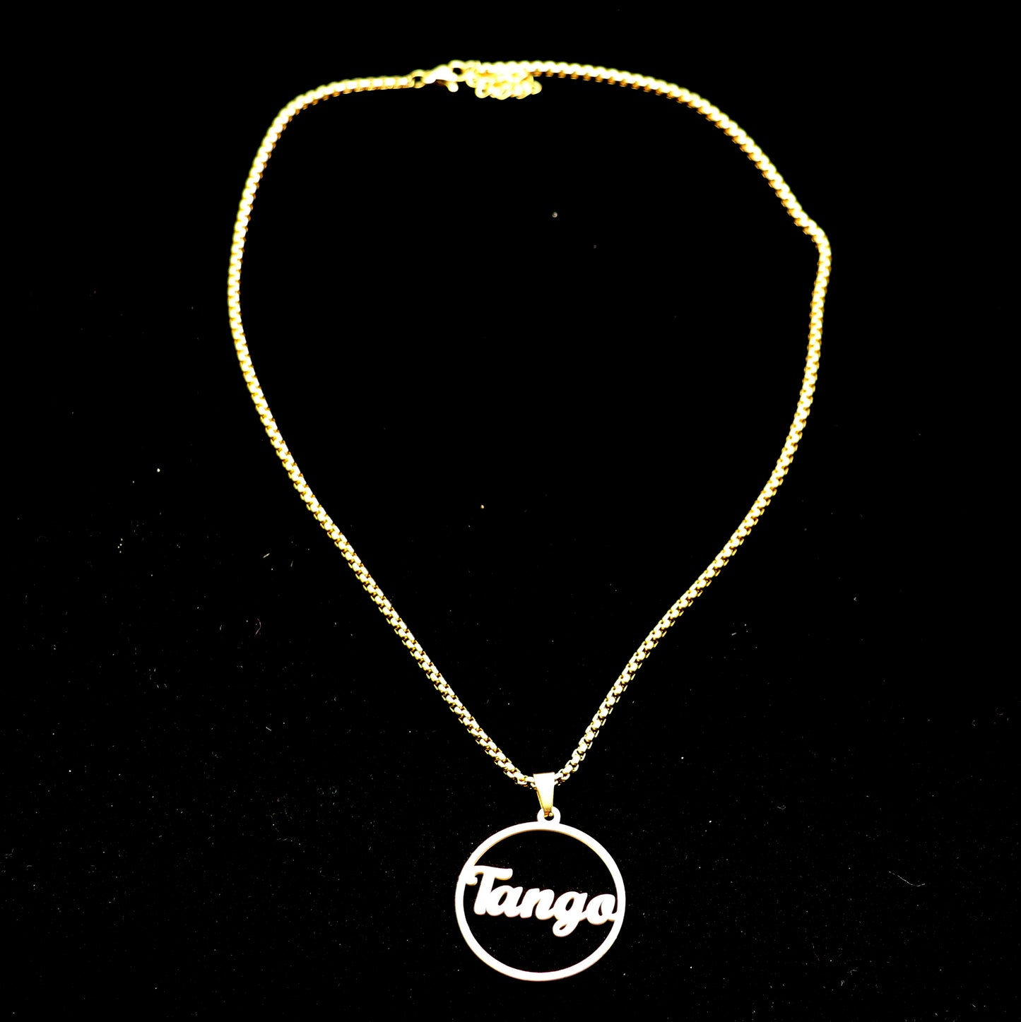 Golden "tango" pendant