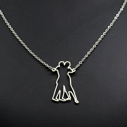 Figure 3 silhouette tango dancers necklace - silver